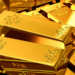 O contrato do ouro para dezembro fechou em queda de 0,57%, influenciado por dólar estável e incertezas geopolíticas. Mercado aguarda discurso do Fed em Jackson Hole por sinais sobre juros nos EUA.