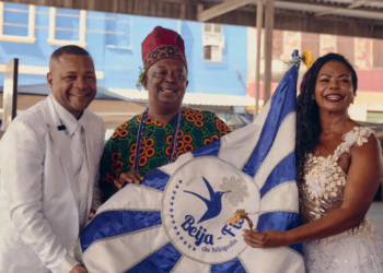 A Beija-Flor de Nilópolis apresenta no Carnaval 2026 o enredo Bembé do Mercado, exaltando a cultura afro-brasileira, a fé do candomblé e a ancestralidade negra.