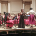 Orquestra Sinfônica Juvenil Chiquinha Gonzaga inicia turnê na Itália com jovens da rede pública do Rio e apresentações em Roma e no Vaticano.