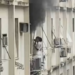 Bombeiros combatem incêndio em apartamento de Copacabana após mulher ser encontrada abrigada no parapeito do prédio.