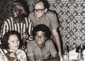 Sua trajetória mistura arte, violência, perseguição policial, marginalização e sobrevivência nas ruas da Lapa, especialmente nas primeiras décadas do século XX.